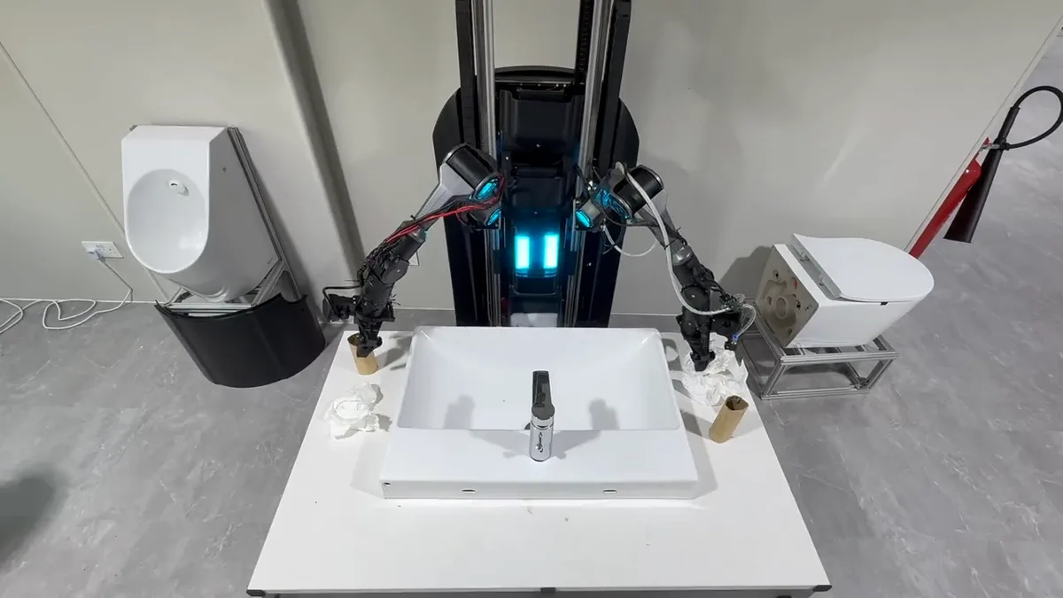 Official Griffin Labs demonstration frame showing both robot arms reaching for objects beside a sink.